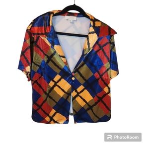 Labelrail X Francesca Perks red, blue, green, gold, and black blouse.